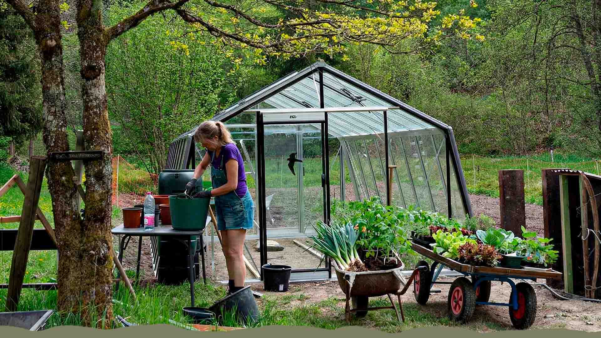 Henja planting vegetables in the garden of Restaurant La Truite d'Argent